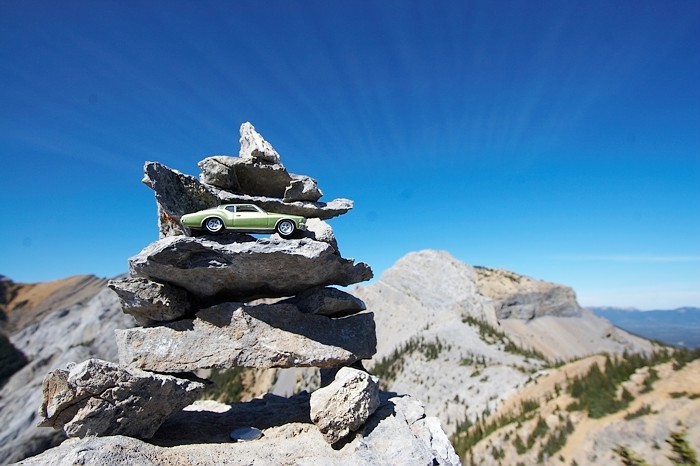 Chilling on the summit cairn at Windy Point Ridge